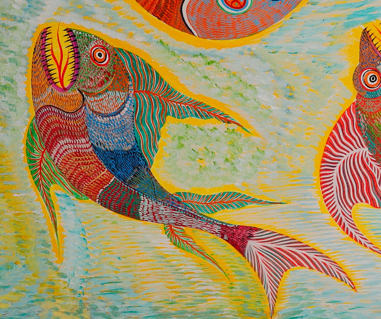 Fish with a yellow mouth open upward, in the bottom left corner. Detail of Fish Birds and Snake, Chico da Silva by Babá, 2006.
